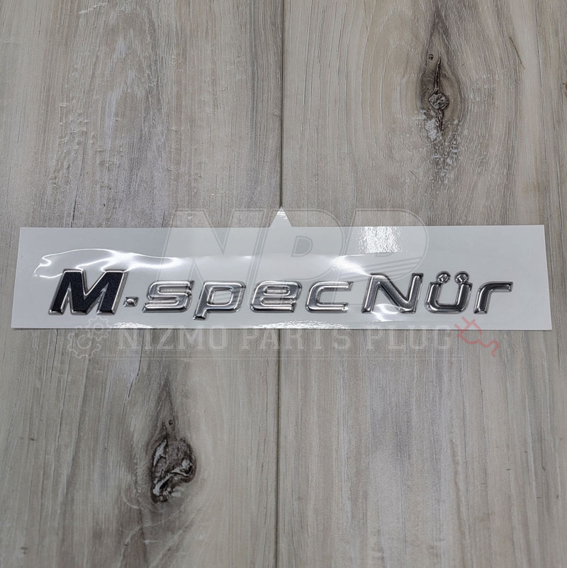 Load image into Gallery viewer, Nissan R34 Skyline GT-R M-Spec Nür Trunk Emblem - NizmoPartsPlug