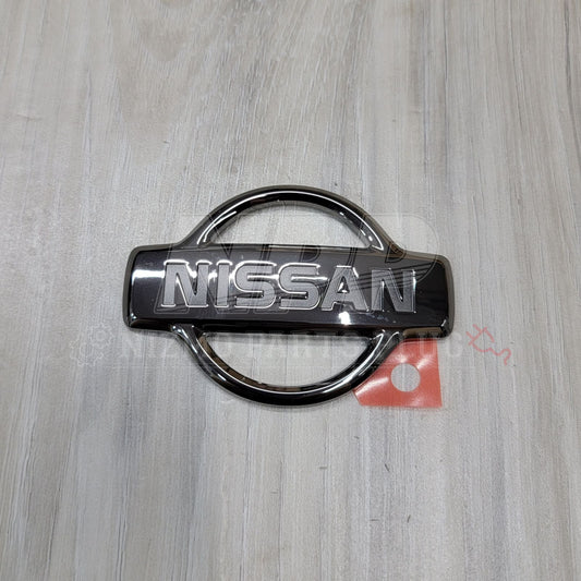 Nissan R34 Skyline GT-R Early Trunk Logo Emblem - NizmoPartsPlug
