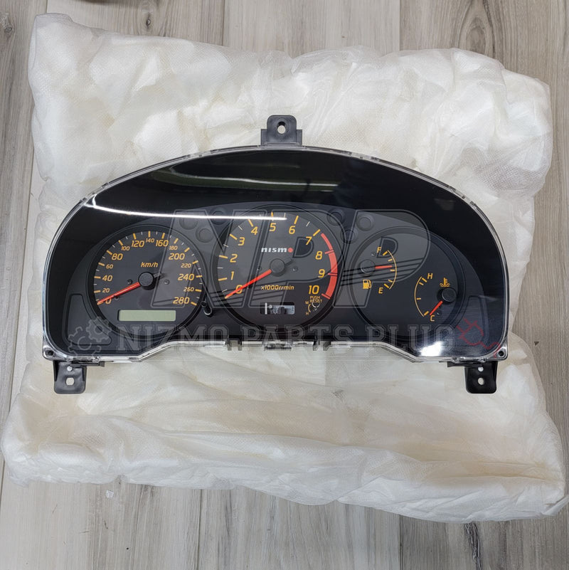 Load image into Gallery viewer, Nismo combination meter assembly for Nissan S15 Silvia, featuring black faces with orange text and red needles.