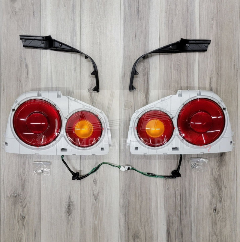 Load image into Gallery viewer, Nissan R34 Skyline Coupe Taillight Assembly Set - NizmoPartsPlug