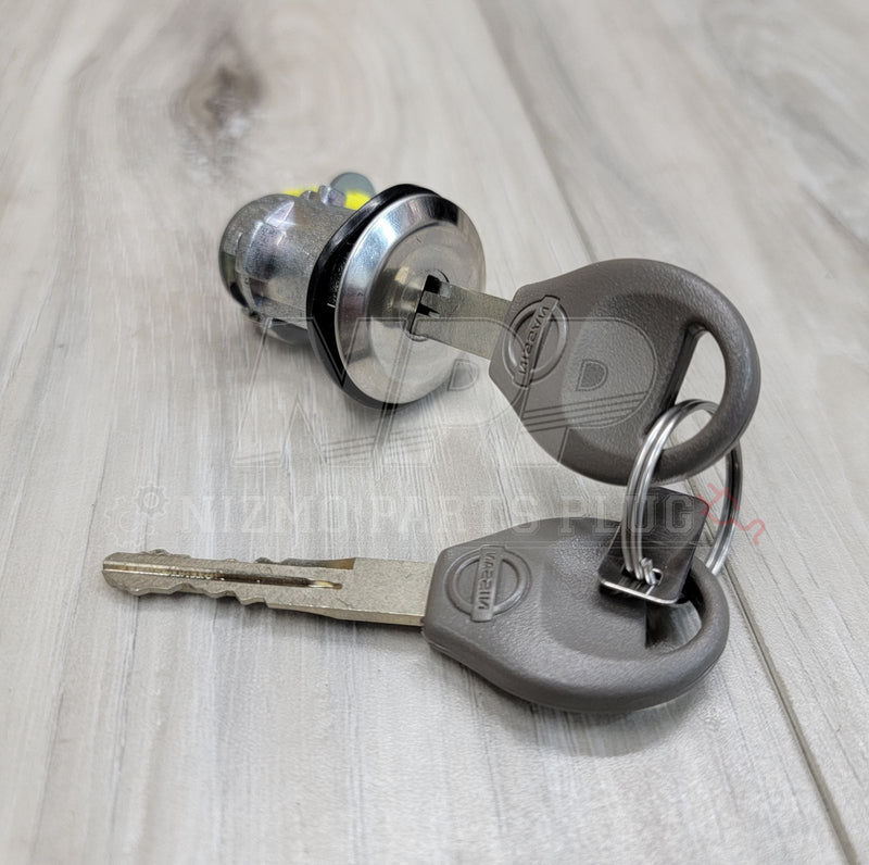 Load image into Gallery viewer, Nissan R34 Skyline Coupe Trunk Cylinder Lock Kit (Late Model) - NizmoPartsPlug