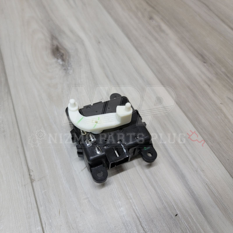 Load image into Gallery viewer, Black and white Nissan S14 Silvia/Stagea A/C air mix door actuator on a wood background.