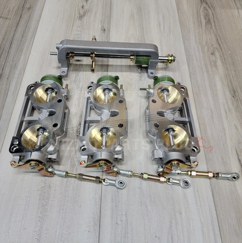 Load image into Gallery viewer, Nissan Skyline GTR RB26DETT Throttle Body Assembly (ITBs) - NizmoPartsPlug