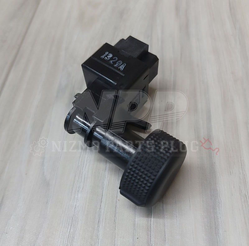 Load image into Gallery viewer, Black Nissan R32 Skyline headlight position switch assembly with textured knob, marked "1329A".