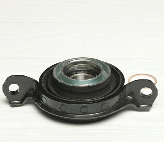 R32 Skyline driveshaft center support bearing assembly for improved drivetrain performance and stability.