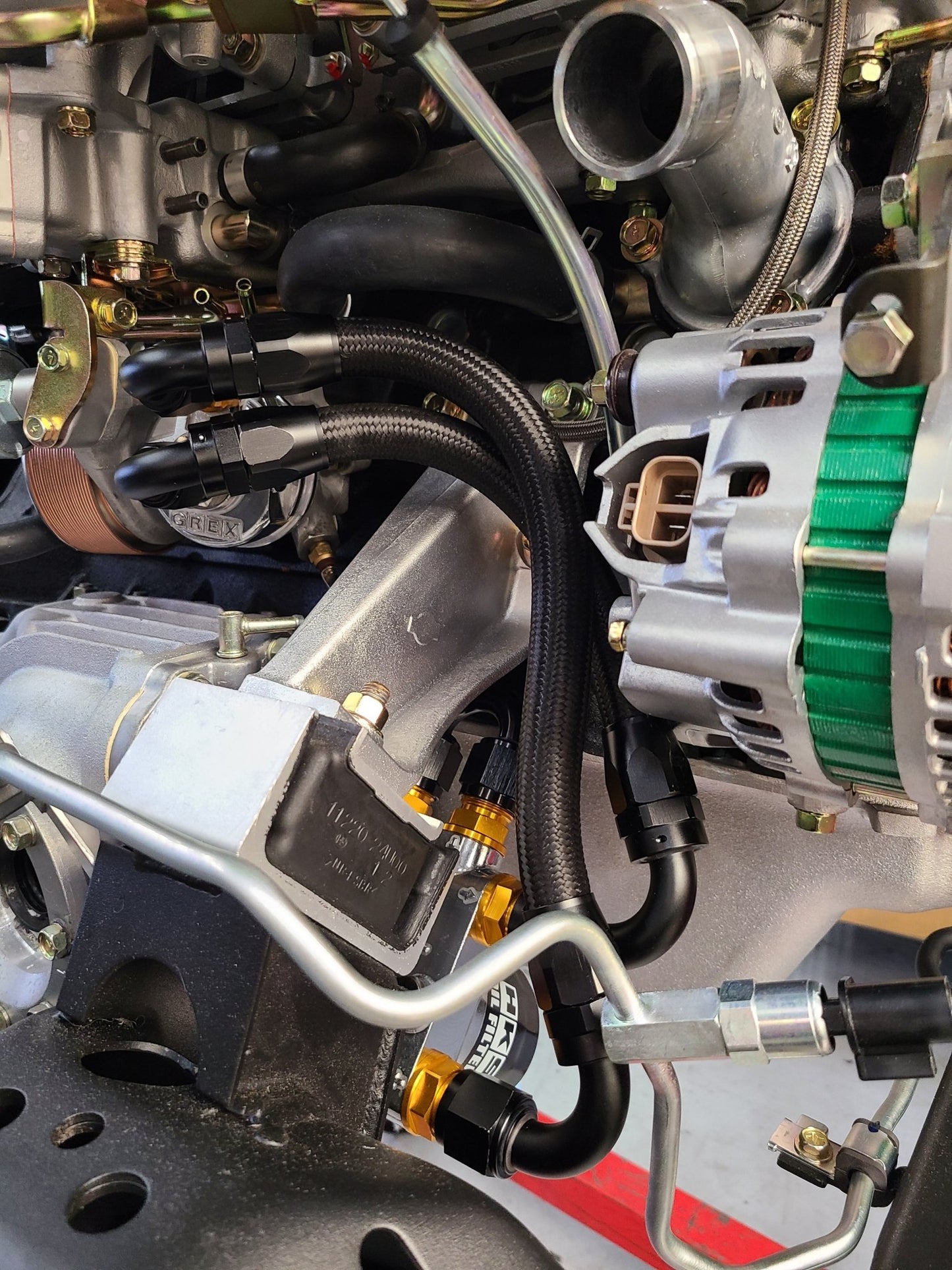 U.P.G Skyline GTR oil filter relocation kit with Greddy oil cooler adapter