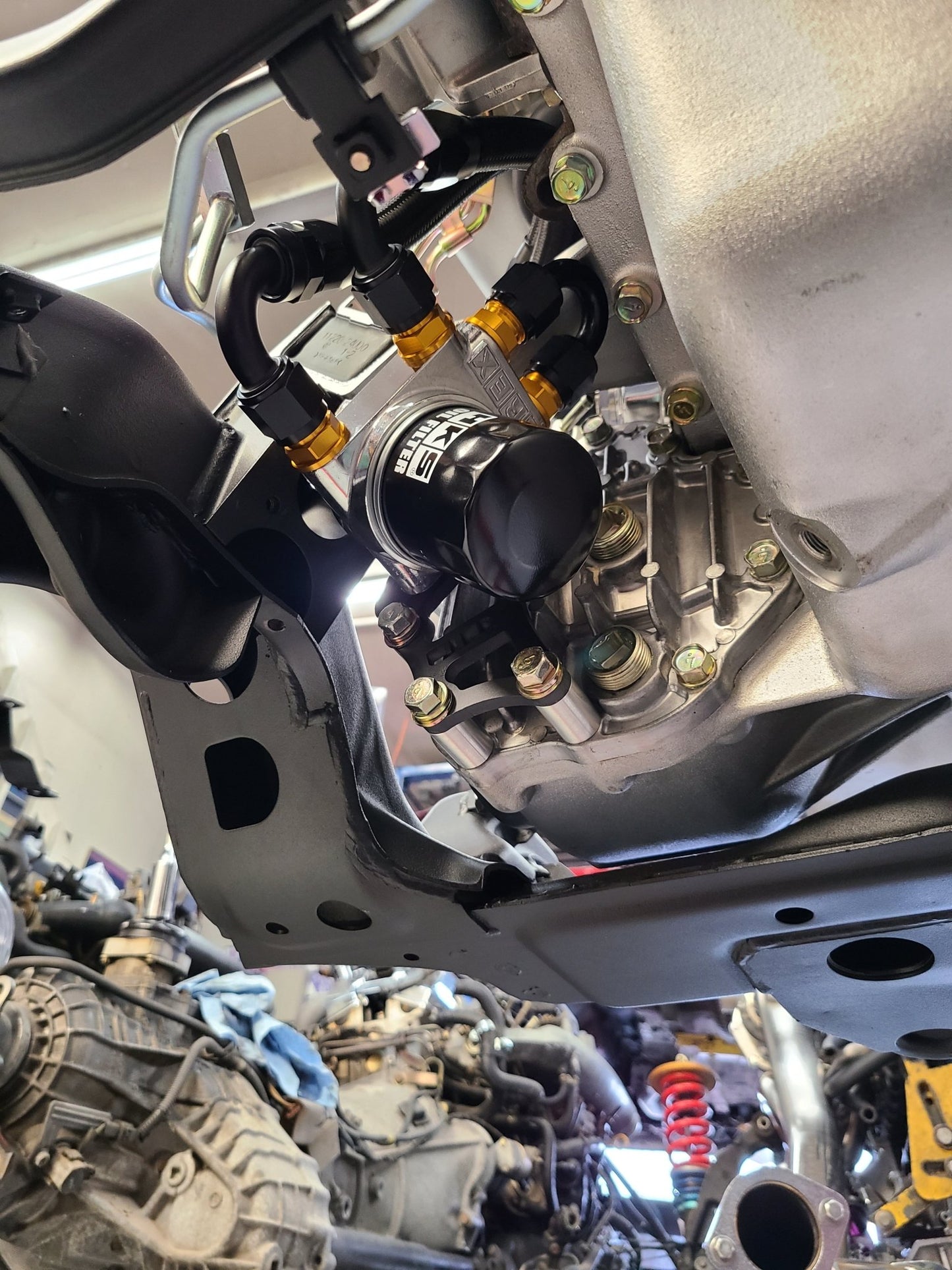 U.P.G Skyline GTR oil filter relocation kit with Greddy oil cooler adapter