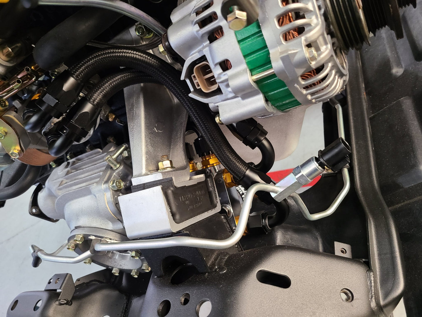 U.P.G Skyline GTR oil filter relocation kit with Greddy oil cooler adapter