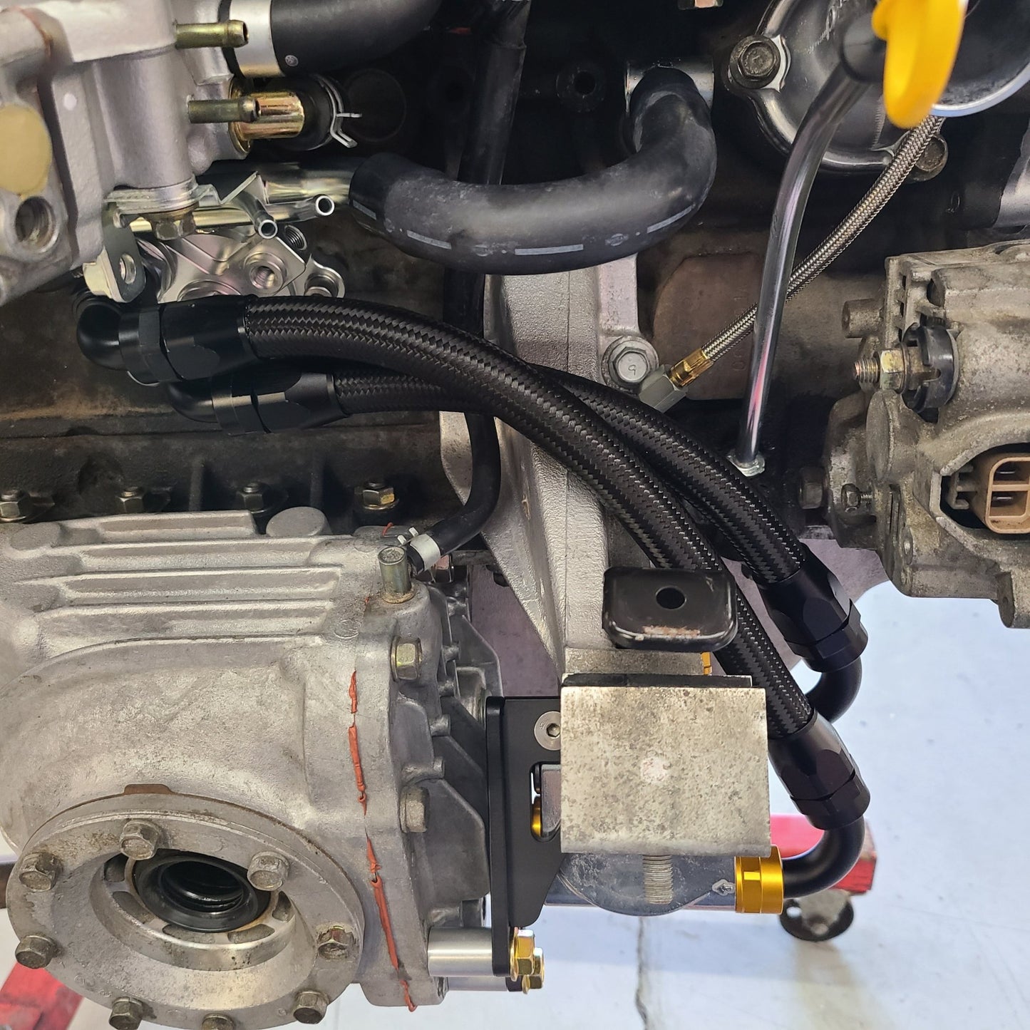 U.P.G Skyline GTR oil filter relocation kit with Greddy oil cooler adapter with Taarks block adapter