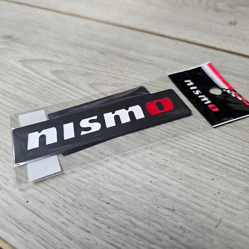 Load image into Gallery viewer, Nissan New Nismo Logo Black Emblem - NizmoPartsPlug
