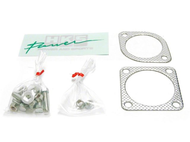 Load image into Gallery viewer, HKS Hi-Power exhaust hardware and gaskets for S14 240SX Silvia, including silver metal gaskets and bags of bolts.

