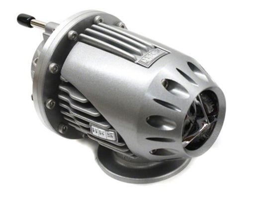 Silver HKS SSQV4 blow-off valve, universal fitment for turbocharged vehicles. New condition, metallic finish.