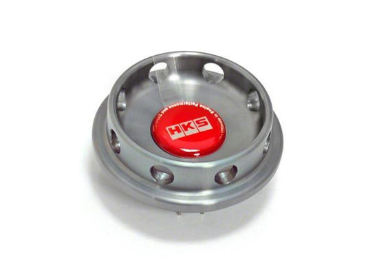 Silver HKS D1 Limited Edition oil filler cap for Mitsubishi, featuring a metallic finish and a red center emblem.
