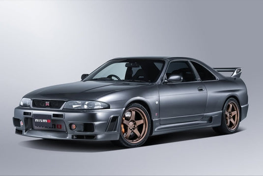 Nismo Omori Factory Rays LMGT4 18-inch bronze wheels on a grey Nissan Skyline R33 GT-R.