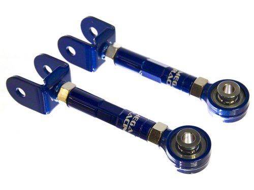 Load image into Gallery viewer, Blue Megan Racing adjustable rear toe arms for Nissan S14 and Infiniti Q45. New condition with metal rod ends.
