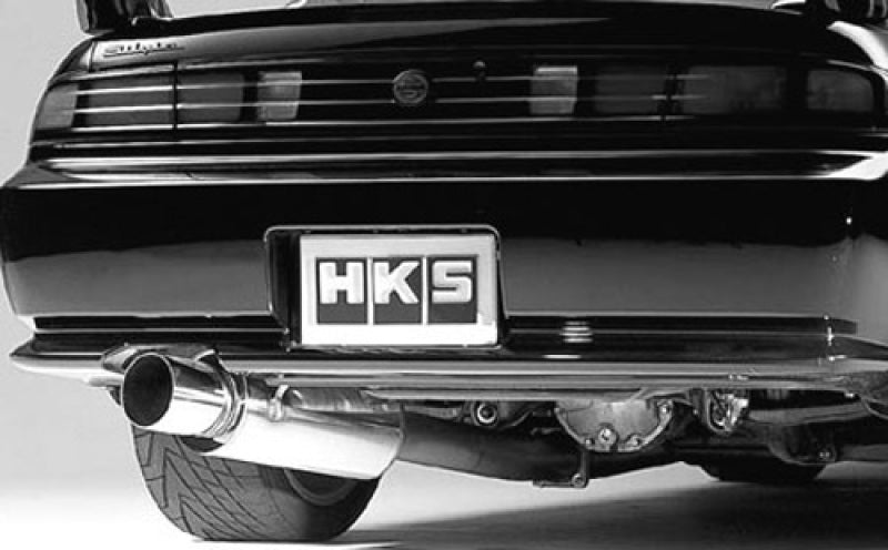 Load image into Gallery viewer, HKS High Power exhaust system on a Nissan S14, featuring a polished stainless steel muffler, shown in black and white.
