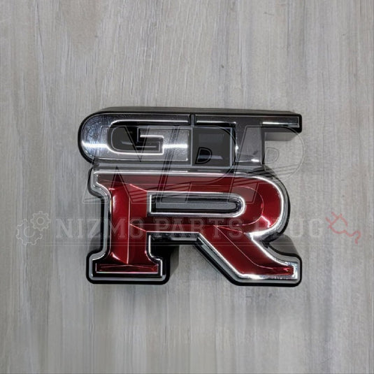 Nissan R34 Skyline GTR Front Grill Emblem - NizmoPartsPlug