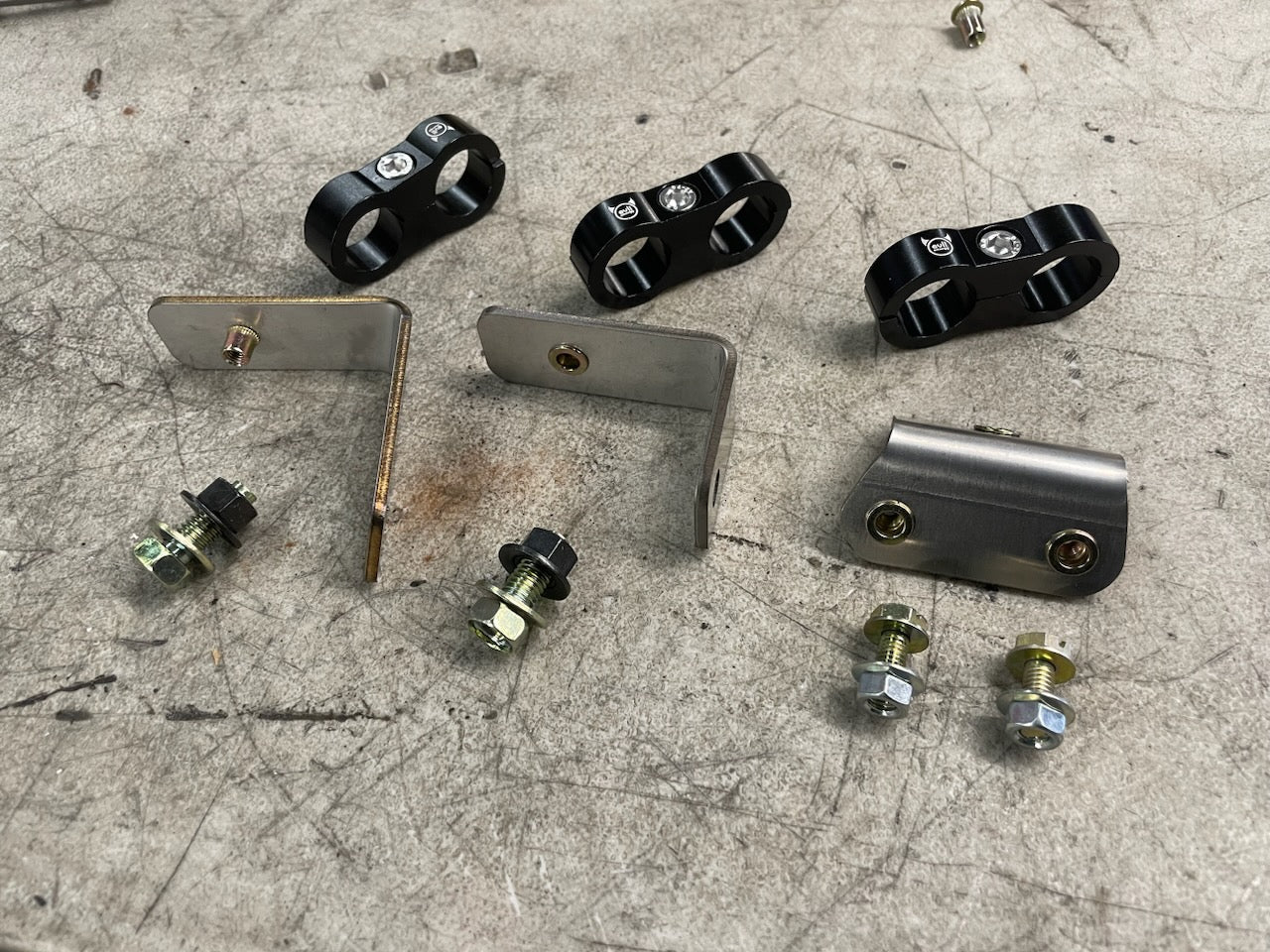 U.P.G. oil cooler hose brackets for the Skyline GTR