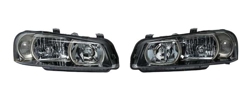 Load image into Gallery viewer, SPDZ1 Nissan Skyline R34 GTR Style OEM Replacement Headlights (Pair)
