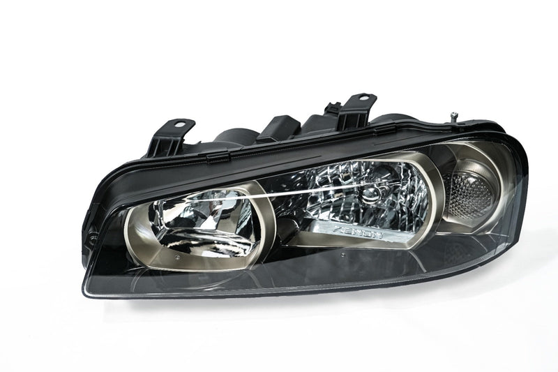 Load image into Gallery viewer, SPDZ1 Nissan Skyline R34 GTR Style OEM Replacement Headlights (Pair)
