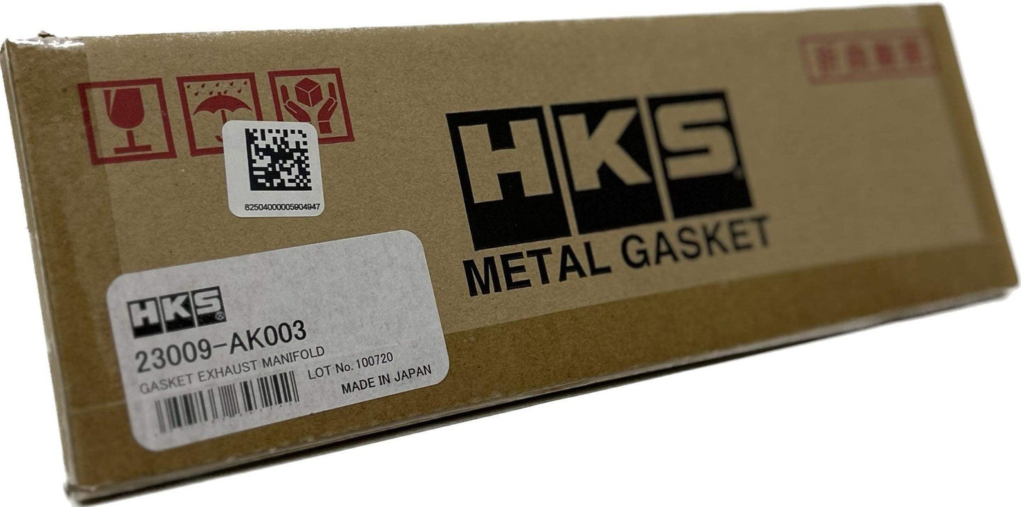 HKS Exhaust Manifold Gaskets packaging featuring part # 23009-AK003, suitable for RB26DETT applications.