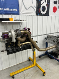 1994-2001 Skyline RB25 DE & DET Remote Top Mount (Hot Parts Kit) installed on engine stand.