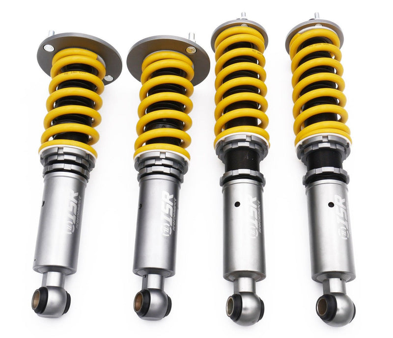 Load image into Gallery viewer, Four new ISR Performance pro-series coilovers for Nissan Skyline R32 GTST with grey bodies and yellow springs.
