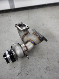 1994-2001 Skyline RB25 DE & DET Remote Top Mount (Hot Parts Kit) showcasing turbo manifold and downpipe.