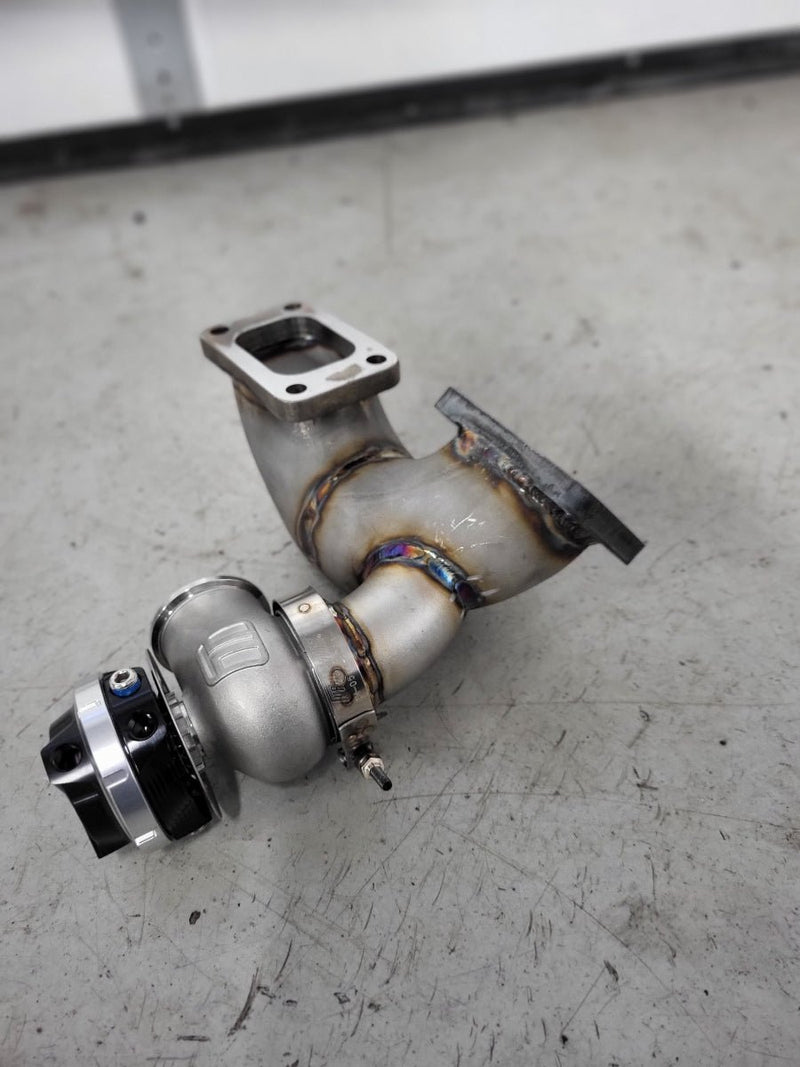 Load image into Gallery viewer, 1994-2001 Skyline RB25 DE &amp; DET Remote Top Mount (Hot Parts Kit) showcasing turbo manifold and downpipe.
