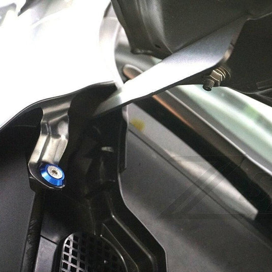 ZSPEC blue billet and stainless fastener installed on an Infiniti Q50/Q60 VR30 engine bay hood hinge.