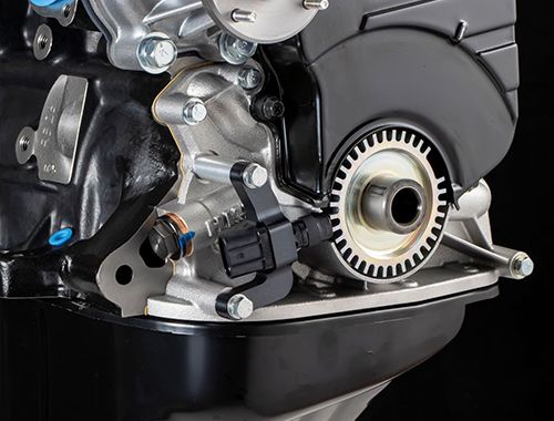 CRANK ANGLE SENSOR CONVERSION KIT RB26DETT FOR V CAM SYSTEM installed on an engine, enhancing ignition accuracy.