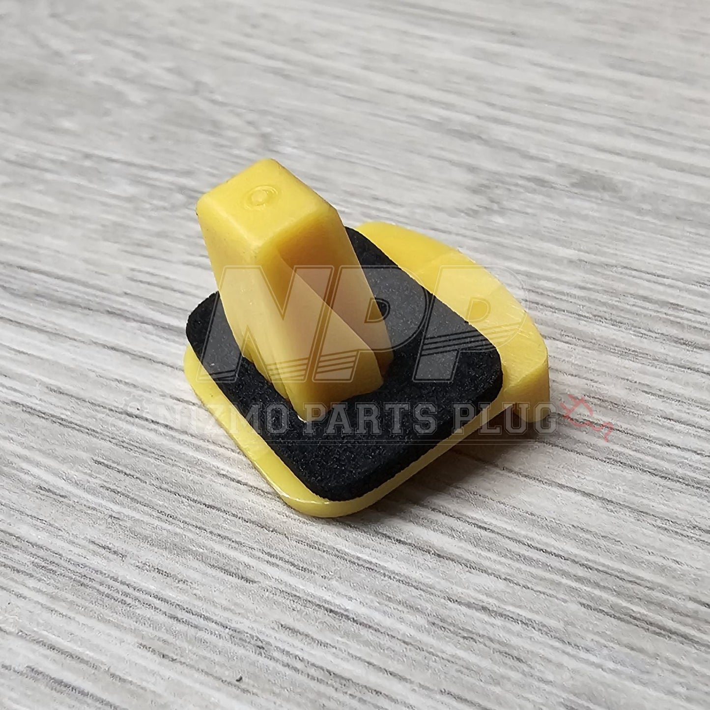 Yellow and black tool on a gray textured surface with '10 Parts Plus' branding.