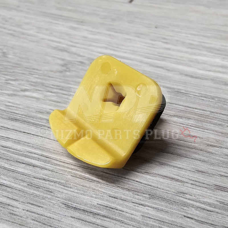 Load image into Gallery viewer, Yellow plastic component on a gray textured surface with 'Hizmo Parts Plug' branding.
