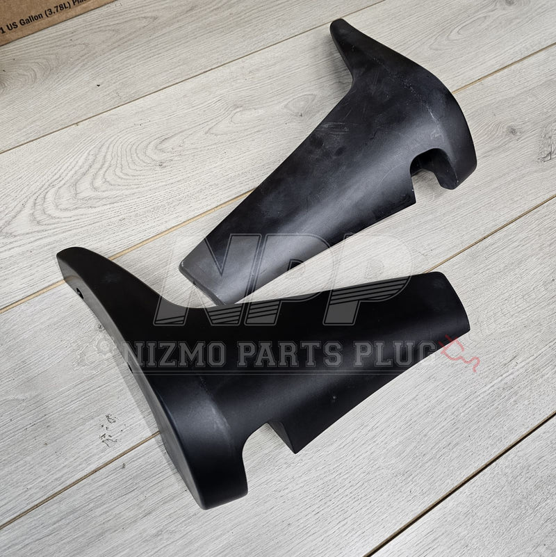 ギャラリービューアに画像をロードする, Black Nissan BNR32 Skyline N1-style rear mud guards/spats on a wood floor.
