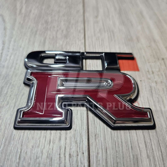 Nissan R33 Skyline GTR Rear Trunk Lid Emblem - NizmoPartsPlug
