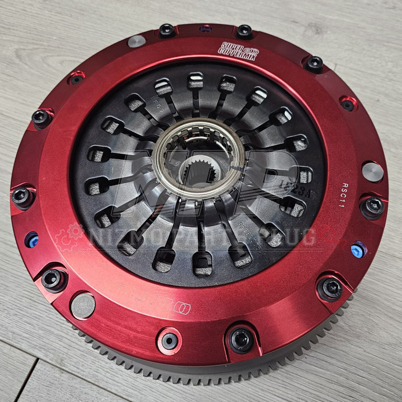 Load image into Gallery viewer, Nissan R34 Skyline GT-R NISMO Super CopperMix Carbon Facing Twin Plate Clutch System - NizmoPartsPlug
