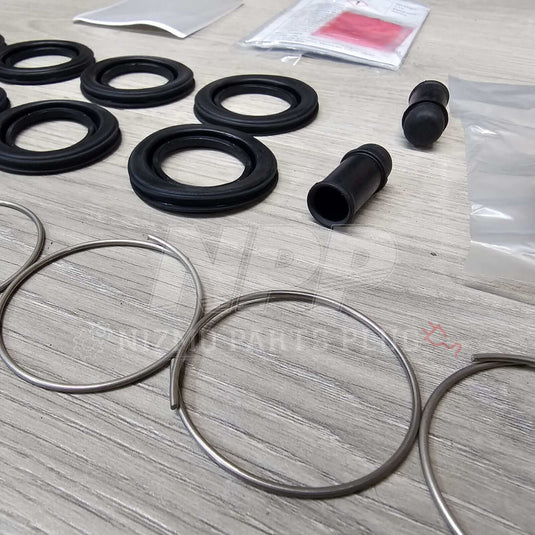Nissan R34 Skyline GTT Rear Caliper Seal Rebuild Kit - NizmoPartsPlug