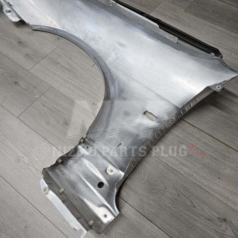 Load image into Gallery viewer, Nissan R33 Skyline GTR Fender &amp; Mounting Riser Set (Pre-Owned) - NizmoPartsPlug
