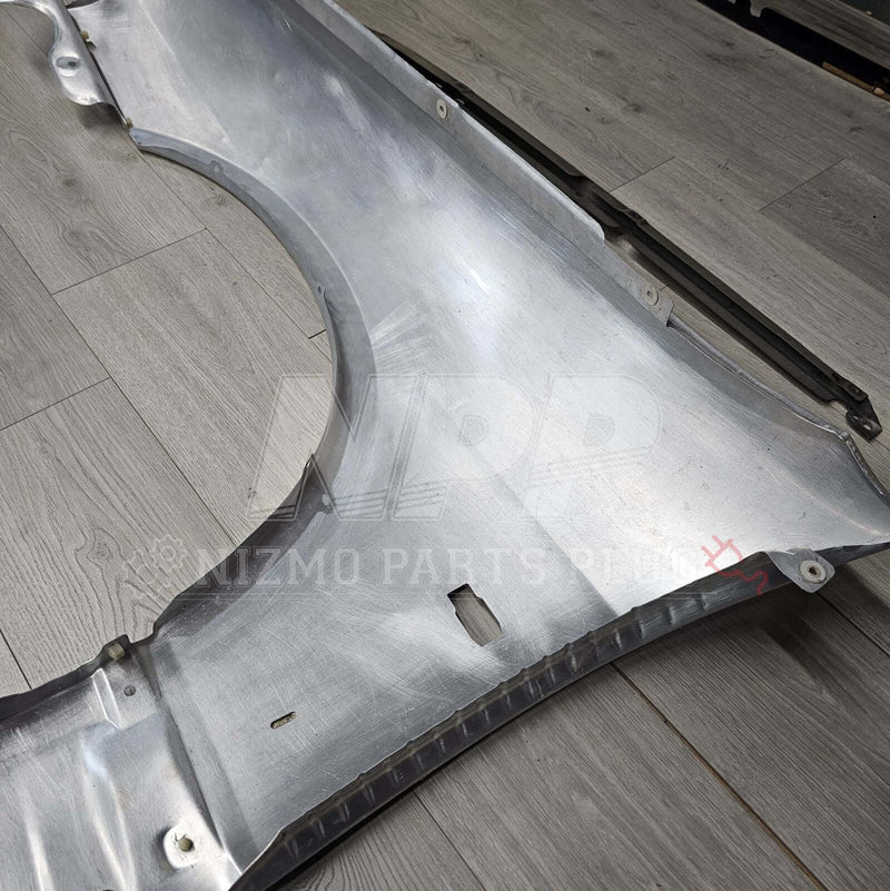 Load image into Gallery viewer, Nissan R33 Skyline GTR Fender &amp; Mounting Riser Set (Pre-Owned) - NizmoPartsPlug
