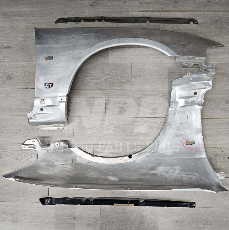 Load image into Gallery viewer, Nissan R33 Skyline GTR Fender &amp; Mounting Riser Set (Pre-Owned) - NizmoPartsPlug
