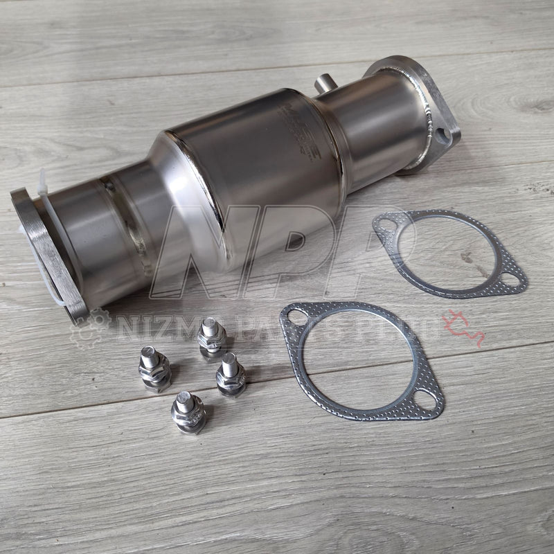 Load image into Gallery viewer, Shiny titanium high-flow catalyst for Nissan RB26DETT with included gaskets and mounting hardware on wooden background.
