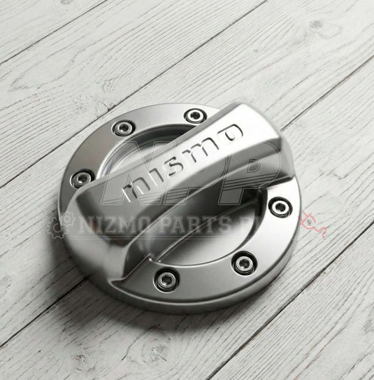NISMO Die-Cast Aluminum Fuel Filler Cap Cover (Multiple Fitment) with metallic silver finish.