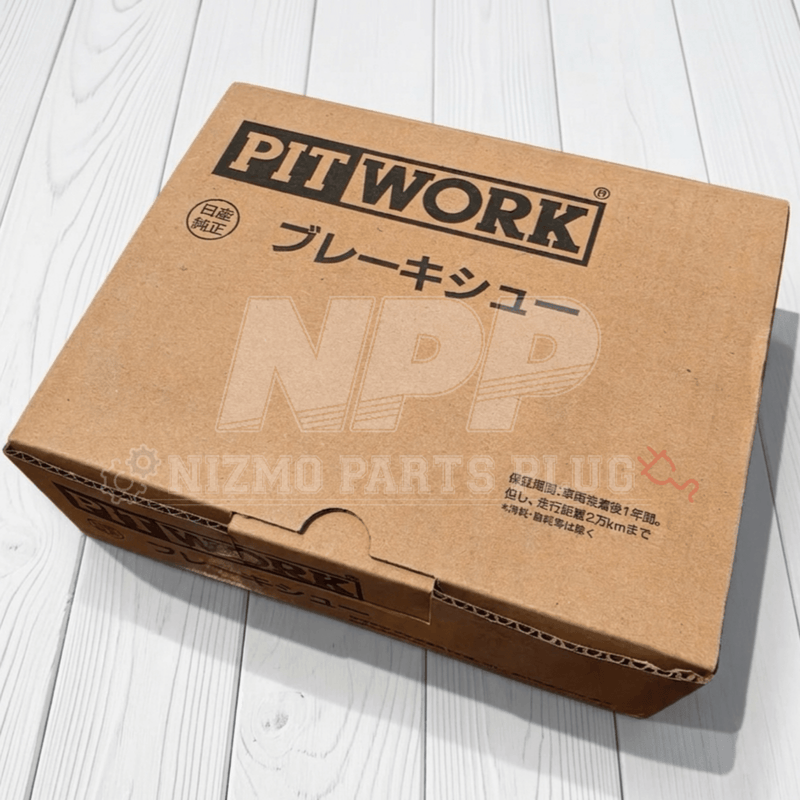 Load image into Gallery viewer, New Pitwork rear brake shoe set box for Nissan Skyline GTR R32, R33, and R34 in brown cardboard packaging.
