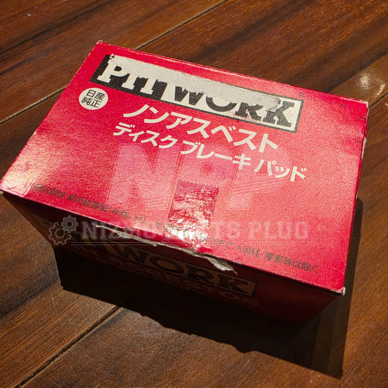Load image into Gallery viewer, Red Pitwork rear brake pad box for Nissan Stagea RS4-V (WC34). Original packaging with signs of wear.

