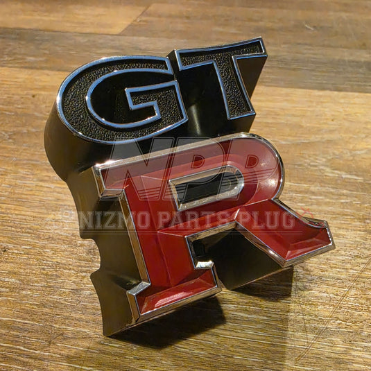 Rare OEM Used Nissan Skyline GT-R (KPGC110) "Kenmeri" Front Grille Emblem – 62319-R4800