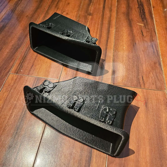 Mīrai Mamōru Reproduction R32 GTR N1 Style Front Air Duct (RH + LH Set) displayed on wooden surface.