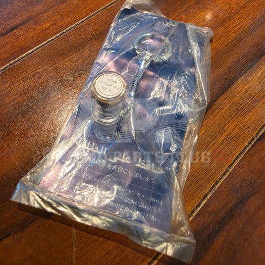 Vintage 70s Showa-Era Nissan Prince "Crude Oil Capsule" Promotional Keychain (UAE / Resource Conservation) - NizmoPartsPlug