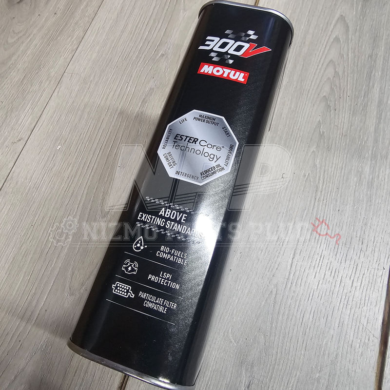 Load image into Gallery viewer, Motul 300V oil can on a wooden surface
