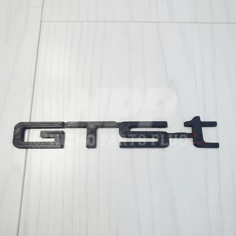 Load image into Gallery viewer, Mīrai Mamōru Skyline Exterior GTST Emblem (GTST STYLE)
