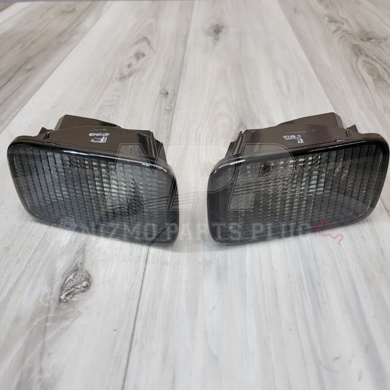 Load image into Gallery viewer, Nissan R34 Skyline GTT GTR Front Turn Signal Indicator Set (Smoked) - NizmoPartsPlug
